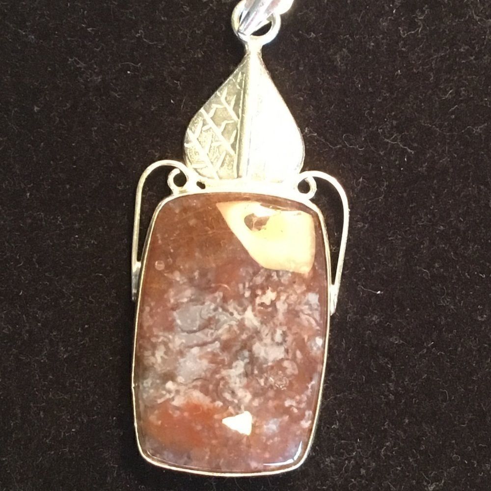 NWOT.ย SterlingโSilverโPlumeโAgate